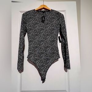 Express bodysuit with tags